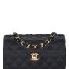 Chanel Black Quilted Satin Round Tab Flap Mini